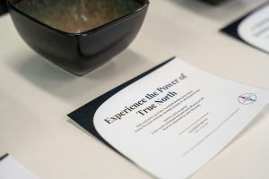 A bowl and paper exhibit "the power of true north."